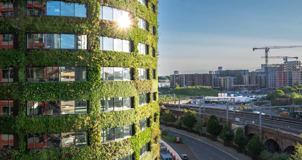 Close-up of Eden building, covered in greenery