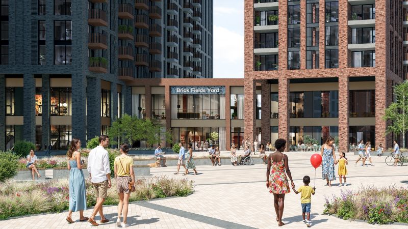 Copilot said:  A landscaped public square sits between tall modern brick apartment buildings, with people walking, sitting, cycling, and gathering around planted areas. The entrance to a building marked “Brick Fields Yard” faces the open plaza, creating a busy residential courtyard scene.